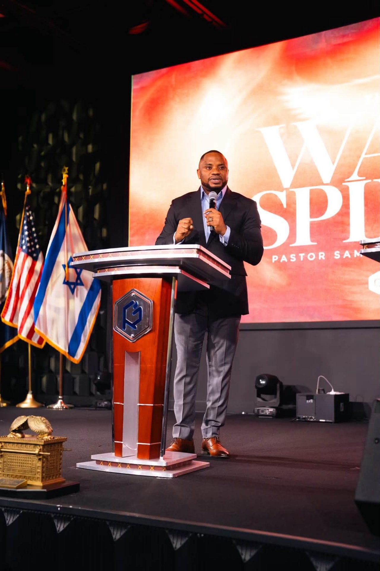 Apostle Sam Onyekachi ministering at a conference